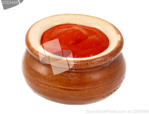 Image of Tomato ketchup served in a small ceramic pot