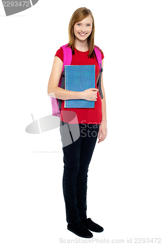 Image of Charming young girl ready to attend class