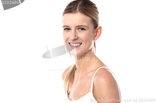 Image of Smiling teenager in spaghetti top