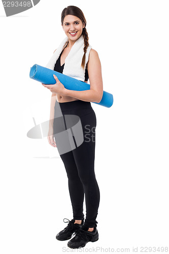 Image of Pretty gym woman pointing forward