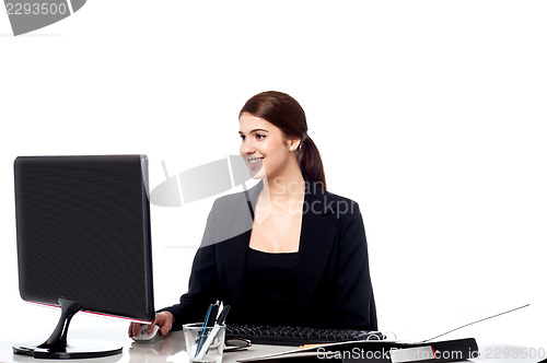 Image of Pretty businesswoman at work