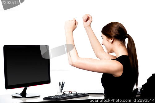 Image of Excited young business lady