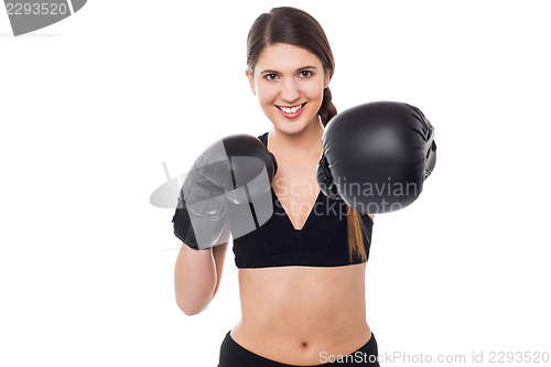 Image of Female boxer ready to punch you