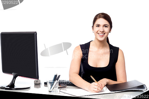 Image of Corporate lady preparing documents