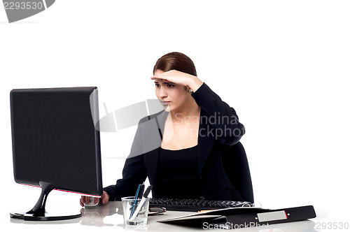 Image of Female secretary focusing on work