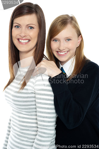 Image of Daughter resting hands on mothers shoulders