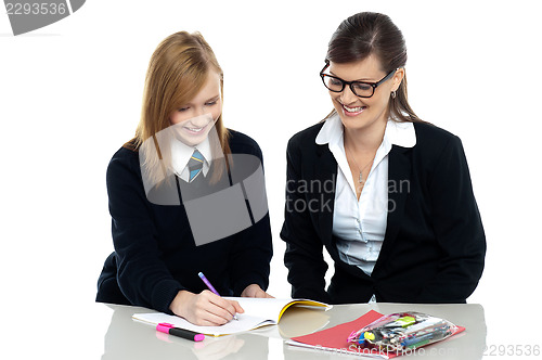 Image of Tutor assisting the student in homework