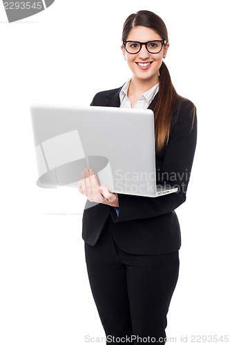 Image of Business lady working on laptop