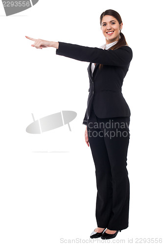 Image of Businesswoman pointing away