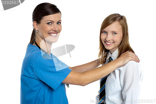 Image of Friendly female doctor with her patient