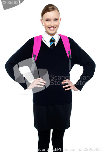 Image of Smiling schoolgirl posing with confidence