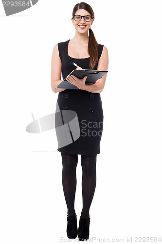 Image of Pretty secretary taking down notes