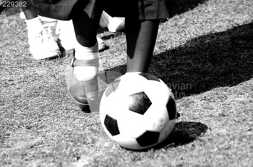 Image of Girl Playing Football