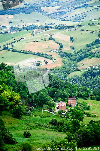 Image of Lovely green lush countryside in the morning light. Italy