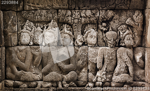 Image of Buddhist carved relief at medieval Borobudur temple on Java, Ind