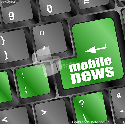 Image of mobile news button on computer keyboard key