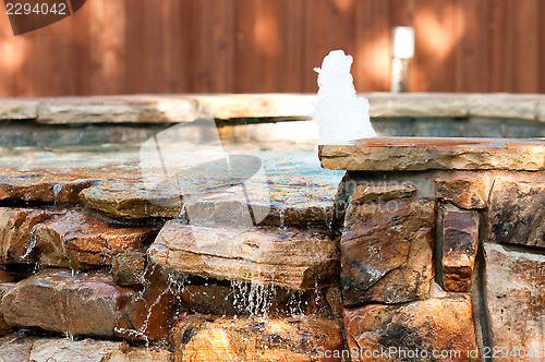 Image of Pool spa with waterfall and fountain