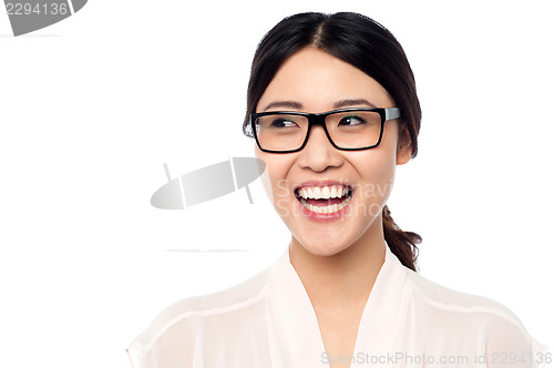 Image of Cheerful young girl in eyeglasses