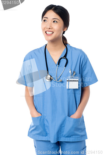 Image of Female doctor in uniform looking away