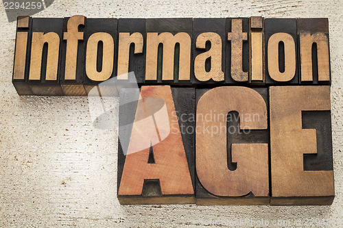 Image of information age in wood type