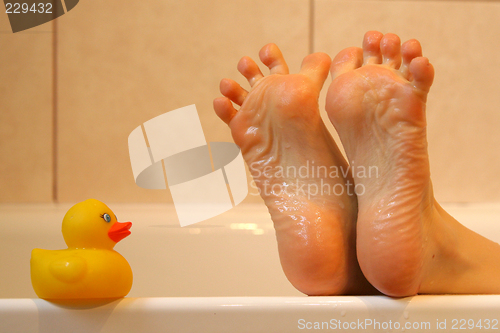 Image of Bath duck meeting feet