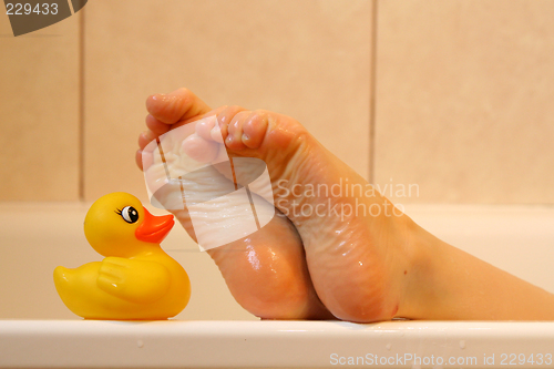Image of Feet taking with bath duck