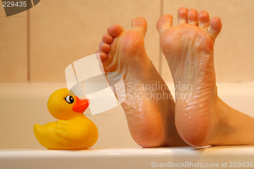 Image of Bath duck meeting feet