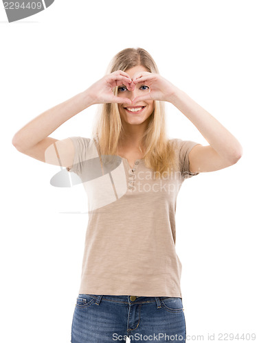 Image of Woman doing a heart with her hands