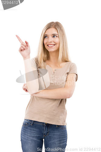 Image of Beautiful woman smiling and pointing