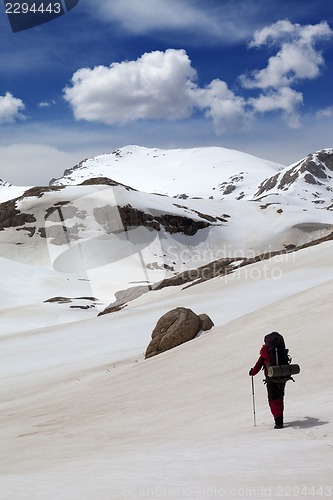 Image of Hiker in snow mountains