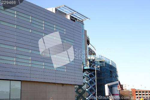 Image of inspectors checking details of a modern building