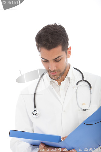 Image of Male doctor reading a patients records