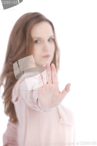 Image of Young woman giving a Stop gesture