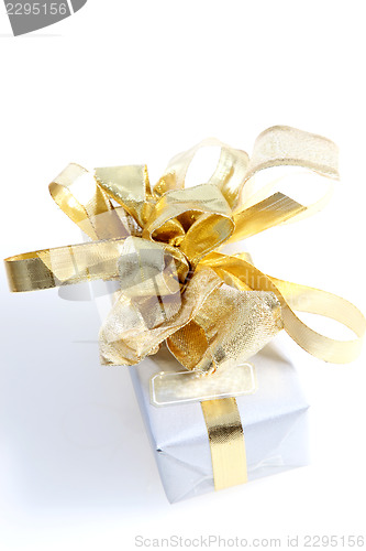 Image of Gift with ornate gold bow