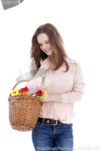 Image of Smiling teenager with a basket of flowers