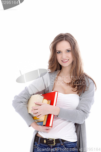 Image of Attractive student carrying her books