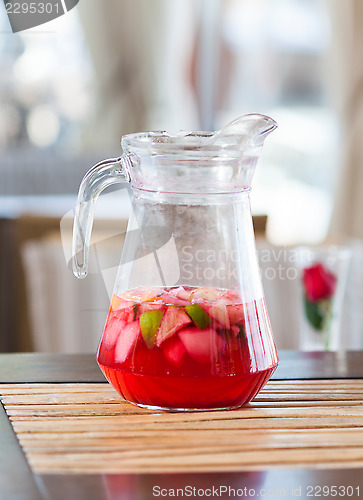 Image of jug of fresh red fruit drink