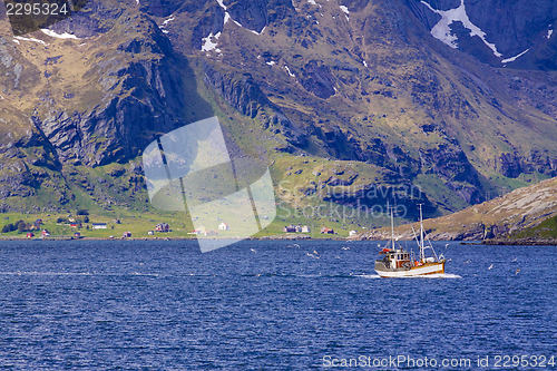 Image of Fishing boat in fjord