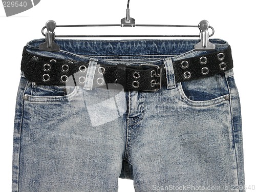 Image of Blue jeans with black leather belt