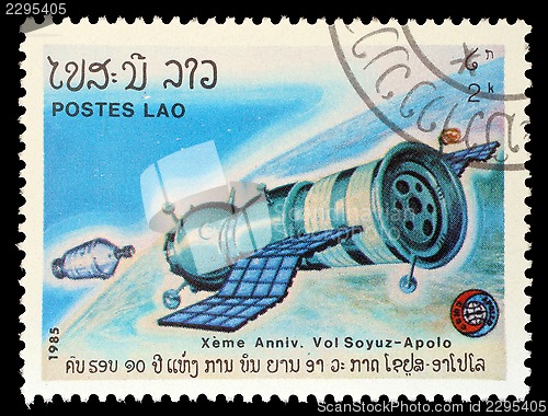Image of Stamp printed in Laos shows experimental flight of Soyuz and Apollo