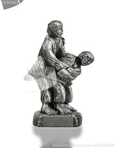 Image of Very old trophy in the shape of two man, judo