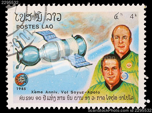 Image of Stamp printed in Laos shows Soyuz 19 and crew A. Leonov and V. Kubasov