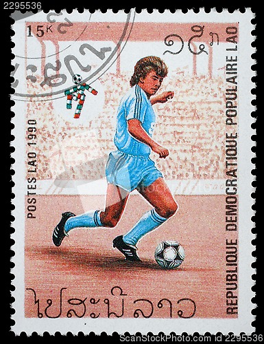 Image of Stamp printed in LAOS shows the football Players