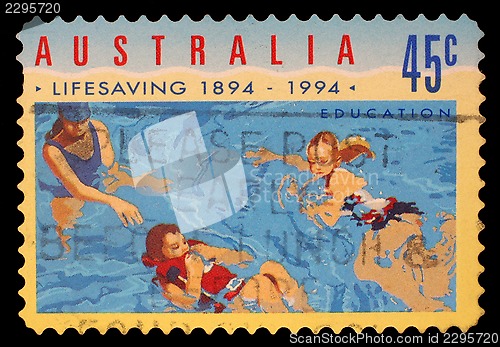 Image of Stamp printed in AUSTRALIA shows the People in Water, Centenary of Organized Life-saving in Australia