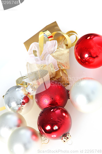 Image of Christmas gift with baubles