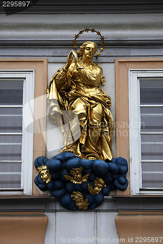 Image of Statue of Virgin Mary on the façade of the house in Prague