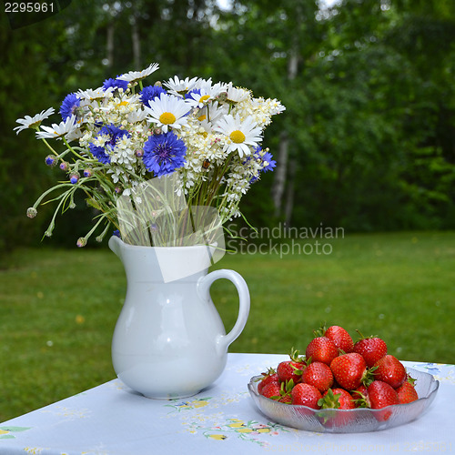 Image of Strawberries and summer flowers