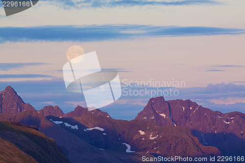 Image of Moon over mountains