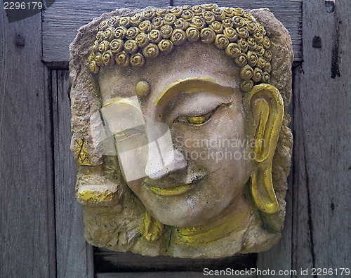 Image of buddha face sculpture