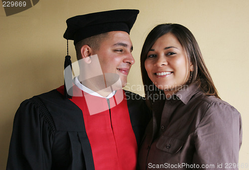 Image of University graduation celebrates his graduation with his girlfri